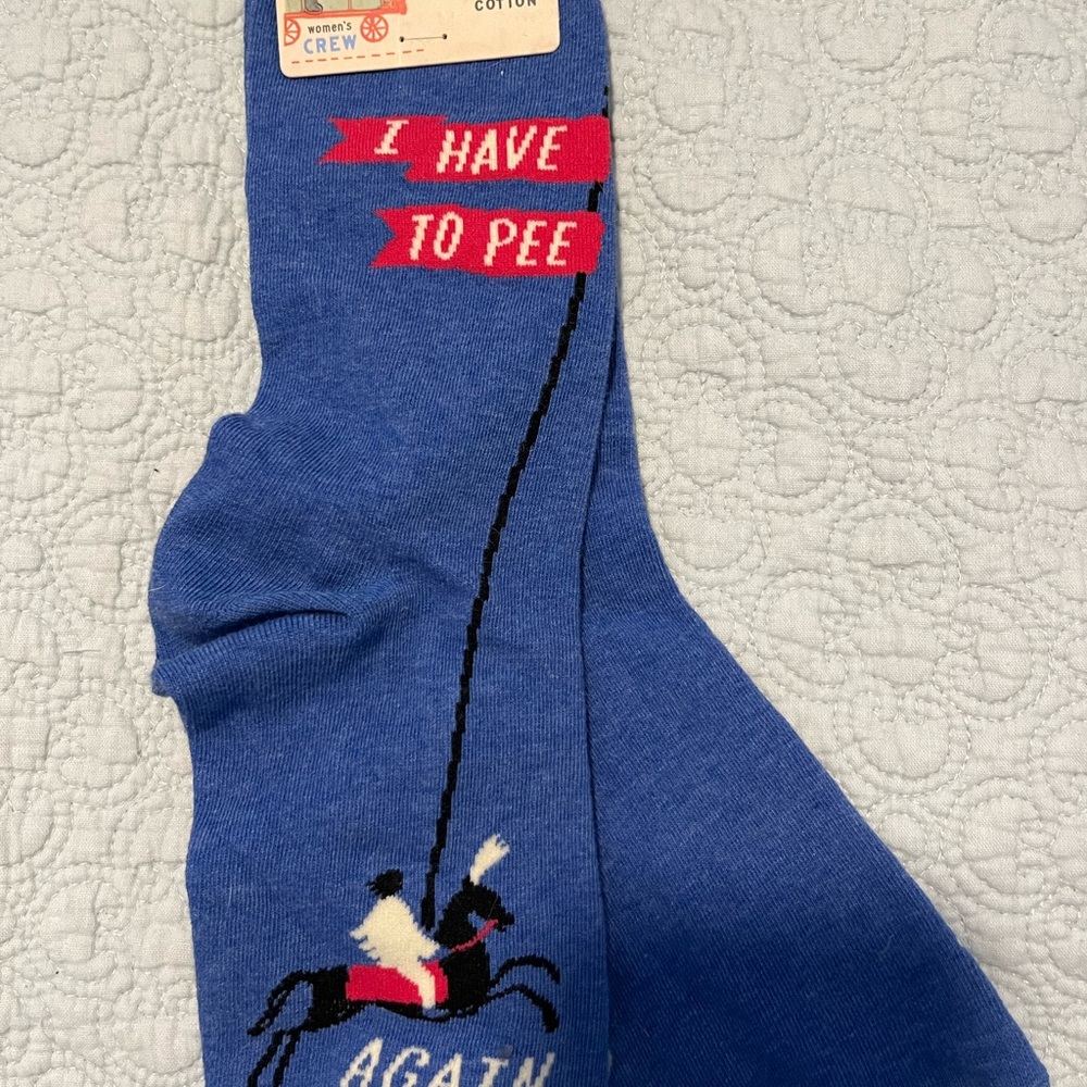 Bundle of funny novelty socks. 2 have been worn and I is new with tags